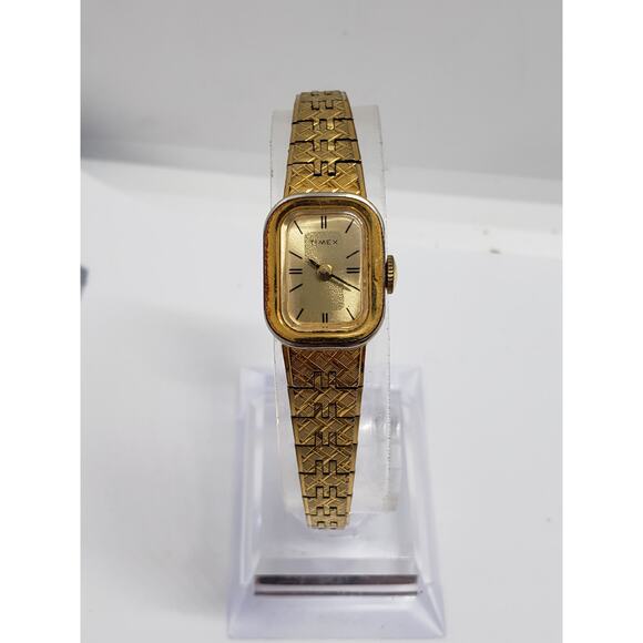 Women\'s Timex watch. Small Gold face with bracelet style band. main image 6